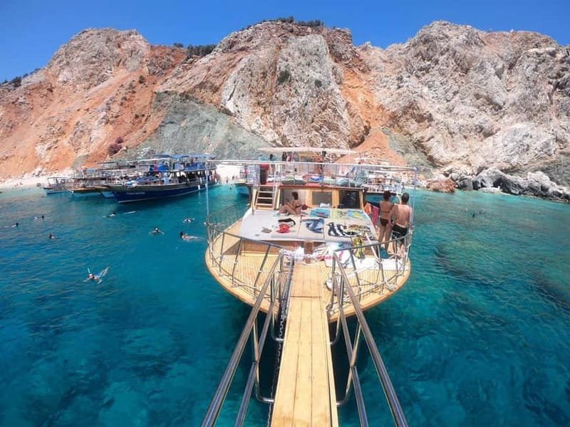 Antalya: Suluada Island Cruise with Dinner and Sunset - Suluada Island swim break: white sand, clear water, and your best photo window