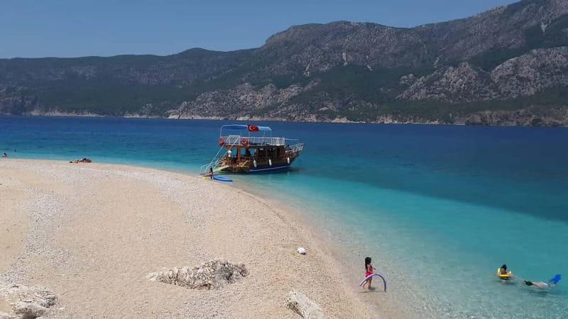 From Antalya/Kemer: Suluada Boat Trip w/Lunch & Snorkeling - The secluded bay stop and the onboard Turkish lunch