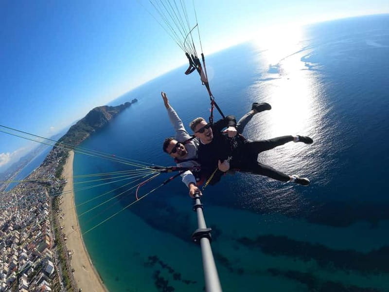 From Antalya: Paragliding Experience w/ Hotel Pickup - The Cliff Run and Tandem Takeoff: What You’ll Feel Above Cleopatra Bay